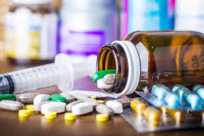 Prescription drugs spilled on table