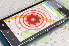 Illustration of contact tracing app on top of a street map