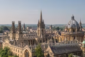 A photograph of the city of Oxford's skyline, with a view of the Radcliffe Camera