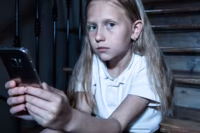 girls experience a negative link between social media use and life satisfaction when they are 11-13 years old and boys when they are 14-15 years old